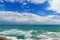 Magnificent sea panoramic landscape. Seascape with impressive blue sky and white bizarre clouds