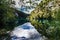 Magnificent sky and tree reflection in the waters of the lake