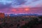 Magnificent Sunset on the La Sal Mountains with Spiral CLoud Formations in Arches National Park