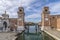 Magnificent view of the entrance towers to the arsenal of Venice, Italy, under a beautiful sky