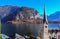 Magnificent view on Hallstatt church, lake and mountains