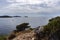 Magnificent view of open, Adriatic sea with distant islands and passing sailing boats off the coast of Rogoznica, Croatia