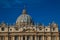 Magnificent view of Saint Peter basilica with moon on blue sky, Vatican City