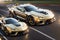 A Magnificent View of State-of-the-Art Golden Sports Cars on the Race Track. AI generated