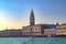 The magnificent view of Venice at sunset in Italy. There are blue sky and clear water