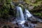 Magnificent waterfall in the german mountain, near the city of Todtnau. Long exposure milk effect