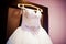 Magnificent wedding dress on hanger