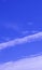 Magnificent white Contrail Cirrus cloud in blue sky. Australia.