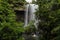 Magnificent Zillie Falls waterfall cascading down a mountain in Australia