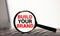magnifier with text Build Your Brand on the white and red background