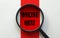 Magnifier with text Online Quiz on the white and red background