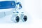 Magnifying binocular glasses close-up. Dental instruments in the