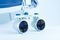 Magnifying binocular glasses close-up. Dental instruments in the