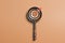 magnifying glass and arrow icon hits center of dartboard target,Setting business goals and focused concepts, Organizational growth