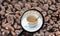 Magnifying glass with background of roasted coffee beans