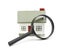 Magnifying glass examining model home