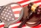 Magnifying Glass and Judges Gavel on The American Flag