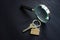 Magnifying glass and key for home. Property appraisal concept.