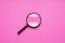 Magnifying glass magnifier loupe search symbol on pink background