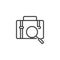 Magnifying glass with portfolio briefcase outline icon