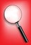 Magnifying glass on red background