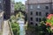 Magra River with the ancient bridge between the houses of Bagnone, a beautiful ancient town in Tuscany, Italy