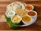 Maharaja Veg Thali from an indian cuisine, food platter consists variety of veggies,paneer dish, lentils,rice,roti, sweet dish,