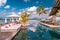 Mahe Seychelles , luxury swimming pool with chairs at the Four Season resort in the mountains La Digue tropical Island