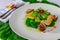 Mahi-mahi fillet and clams with broccoli and fresh herbs
