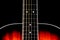 Mahogany Acoustic Guitar Partial Body and Neck on a Black Background