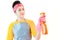 Maid,Young woman wore yellow t-shirt,blue apron and Pink cleaning rubber gloves, Hold bottles, spray cleaners, wipe clean glass