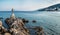 The Maiden with the Seagull. The statue is the symbol of  Opatij, Croatia. Beautiful panoramic view of Opatija town