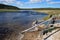 Maidens Grave Hot Spring flowing into the Firehole River in Yellowstone National Park in Wyoming USA