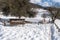 Maienfeld, GR, Switzerland - January 20, 2019: Maienfeld tourist attraction Heidi village in winter with sign and sculpture of the