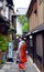 Maiko walking in Kyoto\'s street