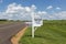 A mail box with a passage of the Holy Bible written in it along a road in a rural area of the State of Tennessee