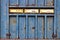 Mail boxes on rusty door