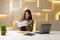 Mail correspondence, a businesswoman received a tax notice, a woman reads documents at the workplace