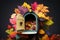 a mailbox surrounded by autumn foliage and colorful leaves