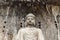 Main Buddha statue in Fengxiangsi Cave, Luoyang, China