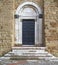 Main door of Sovana Cathedral in Tuscany, Italy