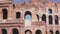 Main Entrance of the Colosseum of Rome Under the Blue Sky in 1960s