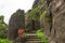 Main entrance gate with Hanuman idol carved in rock at Hatgad fort, Nashik