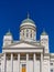 Main entrance to white Helsinki Cathedral with neoclassical green dome