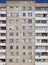 Main facade of multi-apartment large-panel residential building soviet architecture houses.