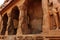 Main hall pillars sculpures and textured wall in mahabalipuram- five rathas