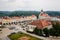 Main Husovo Square, colorful houses on sunny day, renaissance and baroque historical buildings, arcade, Church of the Holy Trinity