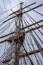 Main mast, crow\'s nest, sails, yards and rigging ropes on the deck of US coastguard tallship Eagle.