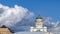 Main neoclassical green dome of white Helsinki Cathedral with a clock