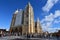 Main And Side Facade With Some Beautiful Clouds In The Sky At Leon Cathedral In Leon. Architecture, Travel, History, Street Photog